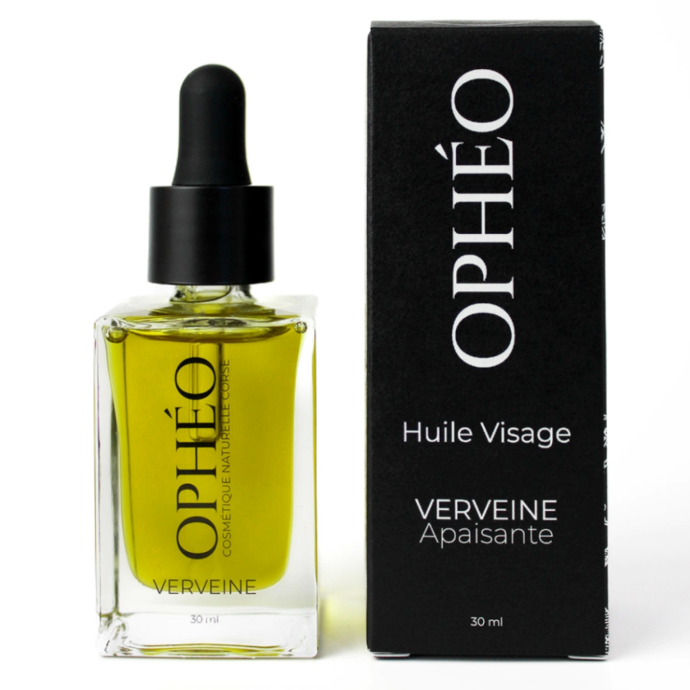 Un flacon d'Huile Visage Verveine Apaisante de la marque OPHÉO, accompagnée de son emballage carton, noir et blanc au style élégant et épuré.